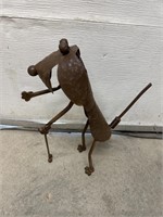 19” by 15” metal springy lawn art dog playing