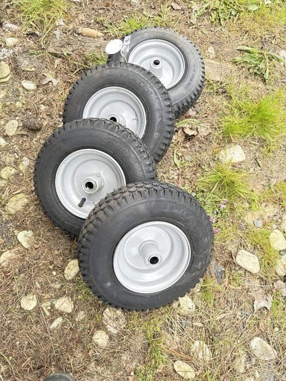 Four tires and wheels size 4 10 x 6