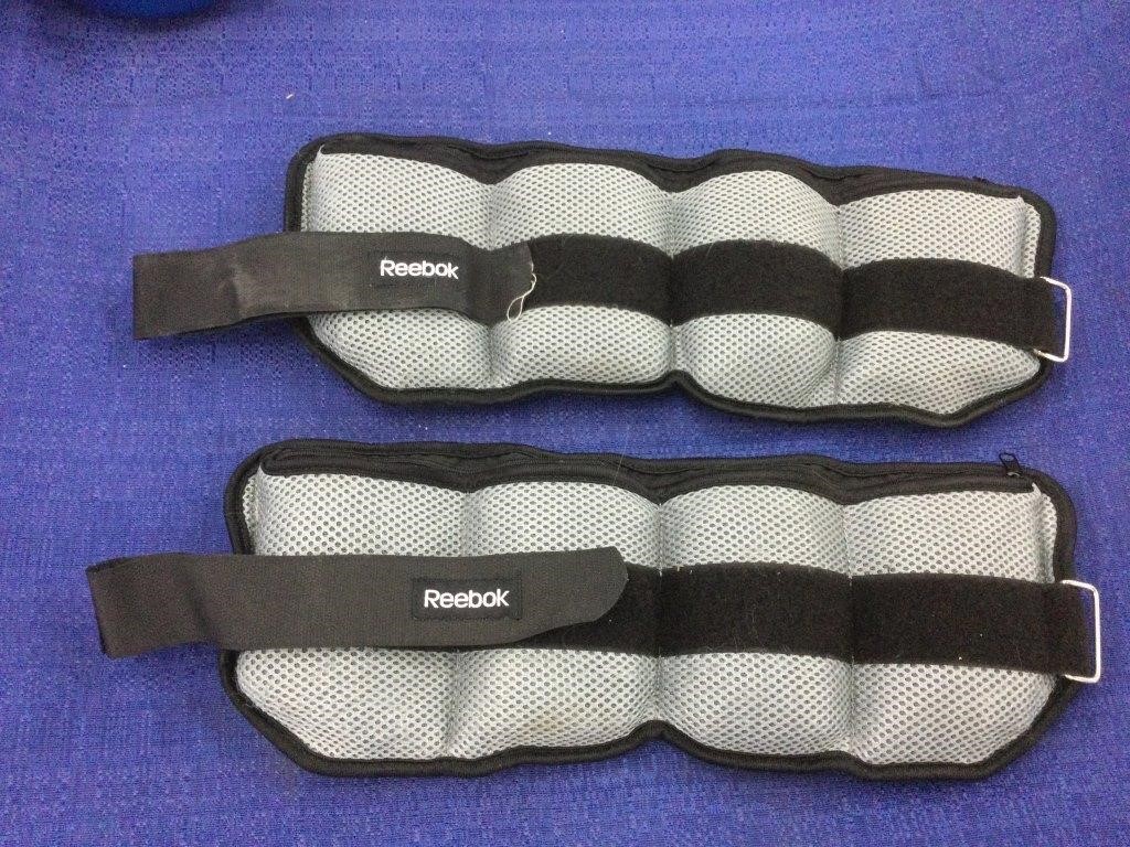 Two Velcro ankle weights with removable weights,