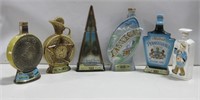 Six Whiskey Decanters Tallest 13"