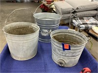 Three metal planter buckets, 8,9, and 10 inches