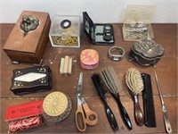 Dresser top items - brushes, lidded boxes,