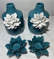 Teal vases with votive holders. Beautiful flowers