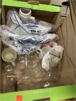 Large box of glassware, decorative items, and