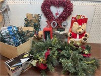 Christmas string lights, garland, teddy bear,