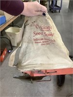 Vintage cyclone seed sower - has tears