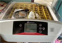 Incubator with automatic Turner