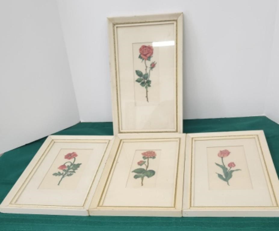 4 cross stitched framed flowers