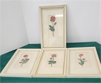 4 cross stitched framed flowers