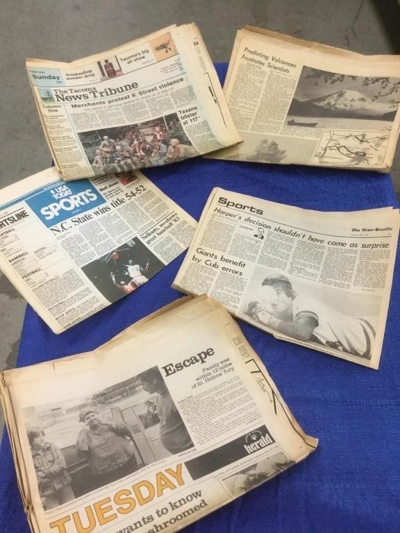 Box of vintage newspapers