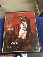 Barry Bonds plaque, Michael Jordan poster, and