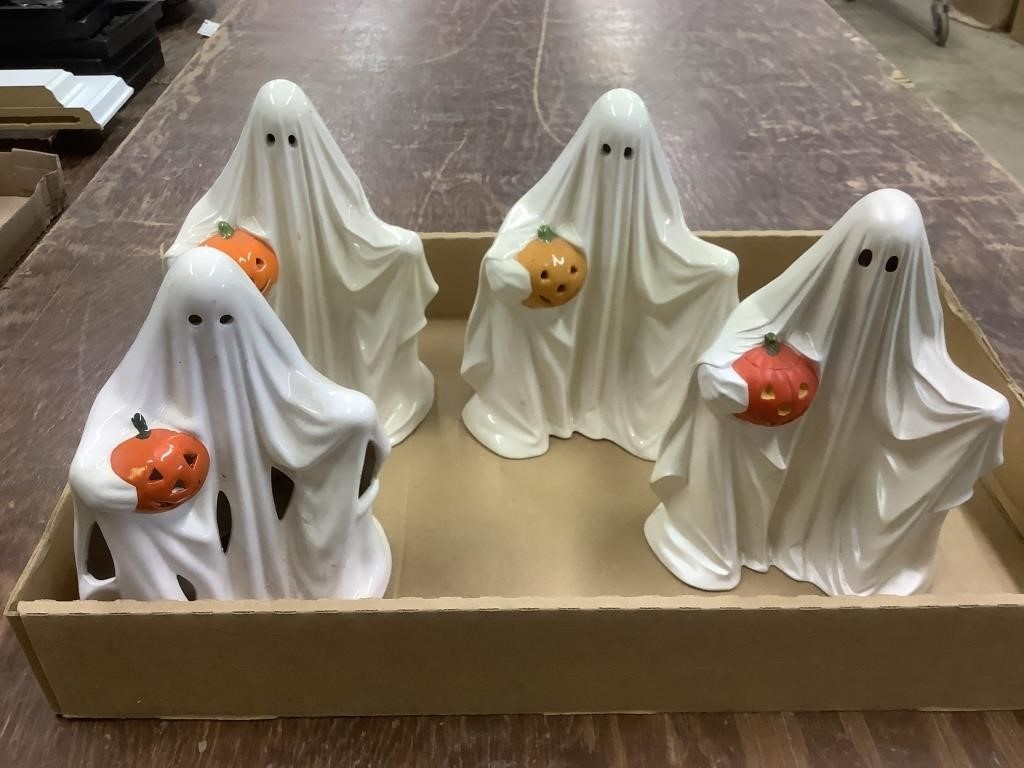Four ceramic ghost figurines