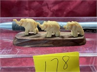 Vintage mini carved wood elephants