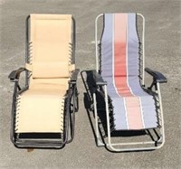 (2) Folding Lounge Chairs. Blue chair has a small