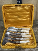 Six sterling & mother of pearl handled butter