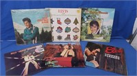 5 Elvis Records & 1 Jimmy Buffet Records