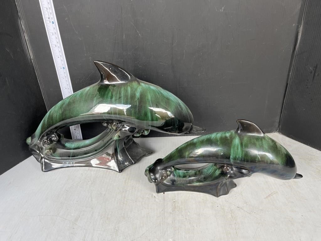 2 pottery dolphins