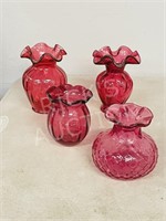 4 cranberry glass vases - 3.5" to 5" tall