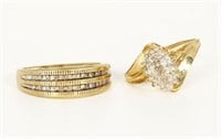 Lot of Two 10K Yellow Gold and Diamond Rings.