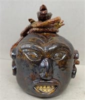 Pottery Head vase with snakes Richard West