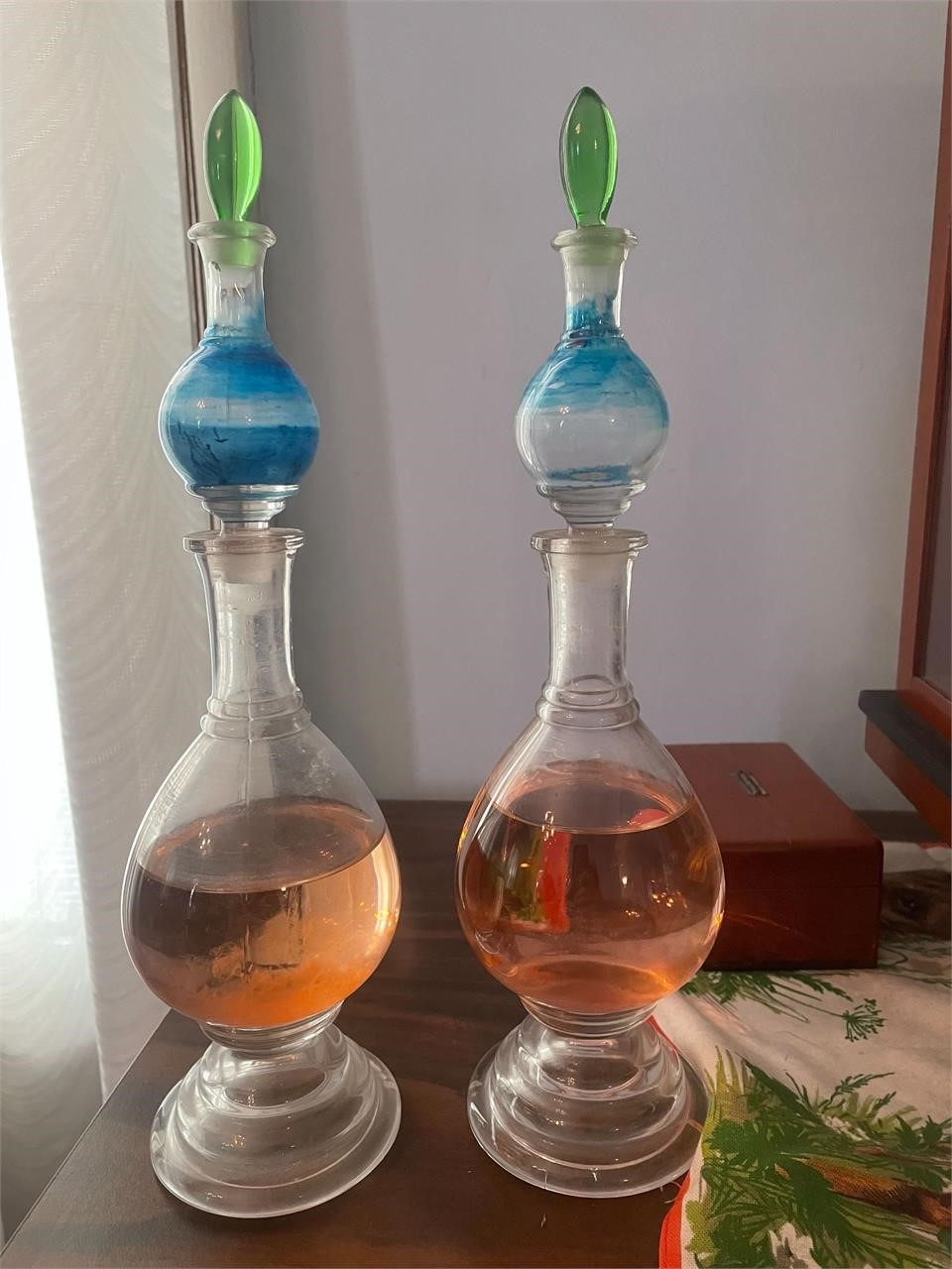 2 fancy bottles apothecary related