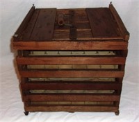 Rustic wooden egg crate carrier.