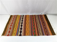 Multi coloured Mexican wool rugs
