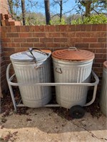 2 metal trash cans w lids and cart