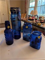 4 blue jars