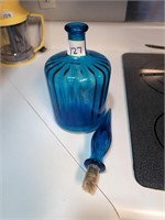 Blue glass decanter w tape around stopped vase