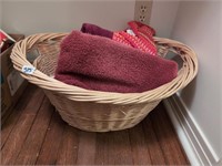 Wicker laundry basket w towels
