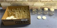 BOX LOT: SELECTION OF SMALL GLASS MUGS WITH LIDS