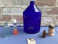 SELECTION OF VINTAGE ADVERTISING  BOTTLES AND A