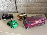 Vintage ERTL Buddy L toy trucks.