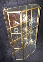 Small brass, glass & mirror wall curio cabinet.