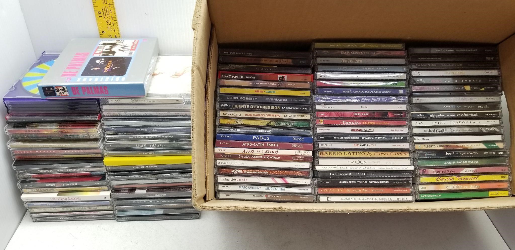 100 LATINO AND OTHER CDs