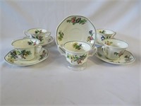 A Collection of Booth's Tea Cups and Saucers