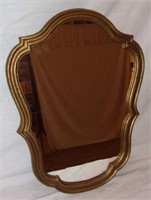 Wooden framed mirror.