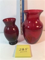 2 red glass vases