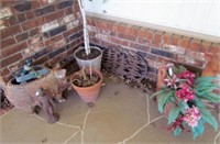 south flowerbed items, pots, figurines