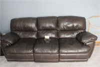 leather like couch with recliners on ends