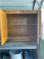 Wooden cabinet with shelf