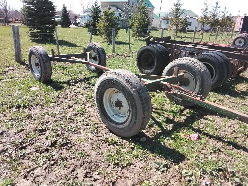 Wagon frame with truck tires.