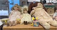2 Porcelain dolls, one handmade doll, & trinkets