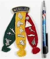 vintage 13 Webelos pins on tri-color ribbon