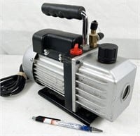 small vacuum pump, powers up