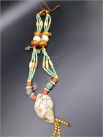 AFRICAN TRADE BEADS VENETIAN GLASS, BONE, AND YOLK