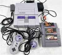 Super Nintendo game system with 2 controllers & 3