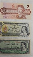 Canadian dollar 2 bills one dollar and one bill 2