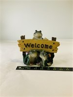 Frog welcome sign statue